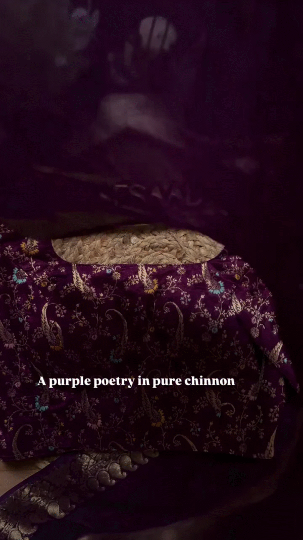A pure chinnon purple jacquard and embroidery saree is a stunning choice for traditional and festive occasions