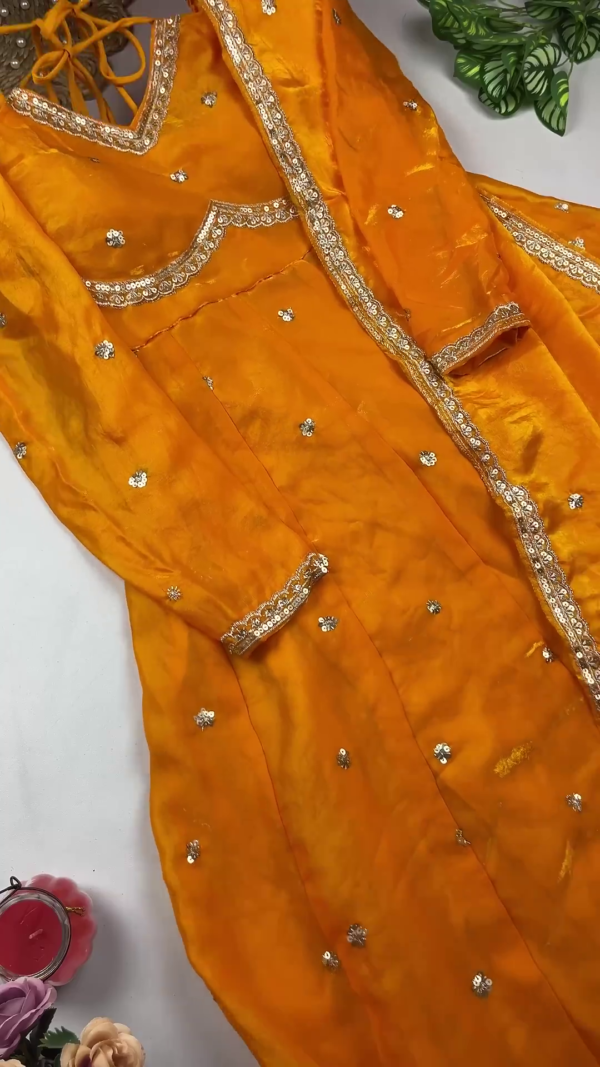 Radiant Peach Pink Anarkali with Scalloped Zari Artistry